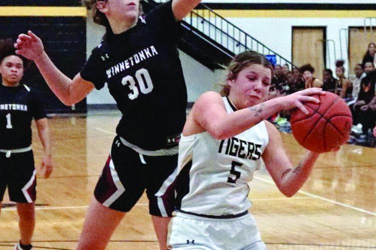 EXCELSIOR SPRINGS SENIOR Baylee O’Dell is fouled Jan. 11 as she goes up for two points against visiting Winnetonka. DUSTIN DANNER | Staff
