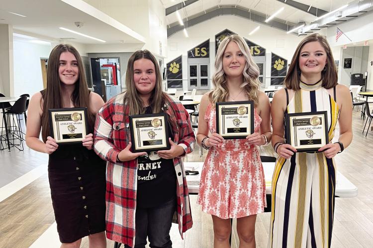 MEET THIS YEAR’S award recipients following Tuesday’s banquet at Excelsior Springs High School for the girls tennis team. Pictured are Shelby Stodden, Most Improved Player; Malaya Tedesco, Newcomer of the Year; Lauren Mueller, Hustle Award; and Anna Selby, Most Valuable Player. DUSTIN DANNER | Staff