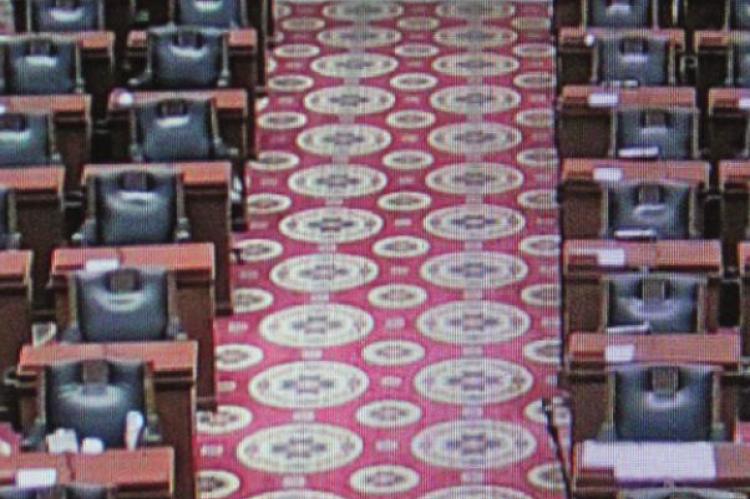 DUE to COVID-19, the Missouri House chamber is nearly empty, with lawmakers entering the chamber one at a time to cast votes.
