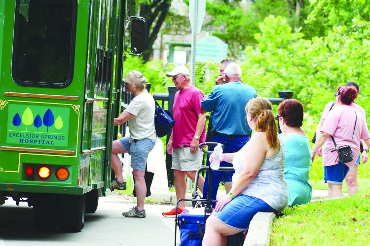 The Excelsior Springs Area Chamber of Commerce trolly service shuttles guests to the wine festival. More photos on page 12. ELIZABETH BARNT | Staff