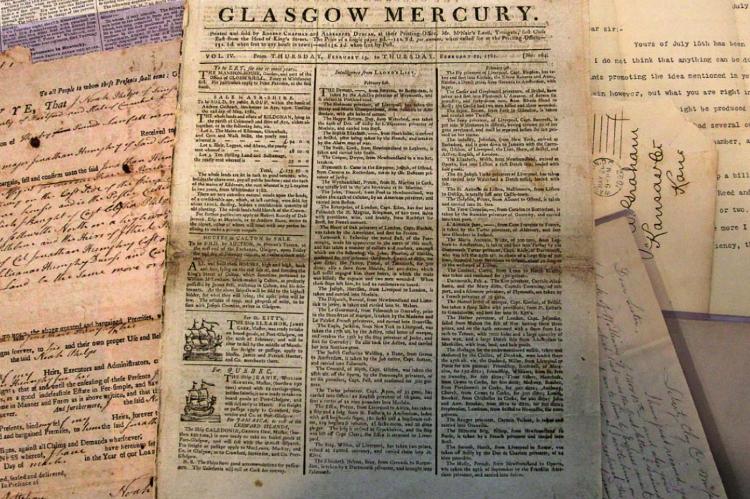 NEVER PERFECT, but working day after day in perfection’s pursuit, newspapers are known collectively for being the “first rough draft of history.” In the foreground is a copy of the Feb. 22, 1781, edition of The Glasgow Mercury. J.C. VENTIMIGLIA | Staff