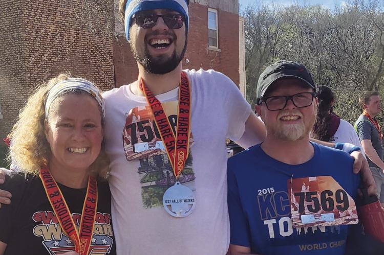 AFTER THE ANNUAL Good Samaritan Tortoise & Hare 5K race, Michelle Prindle, Robbie Farabee and Collin Alderman display their medals. SHARON DONAT | Staff