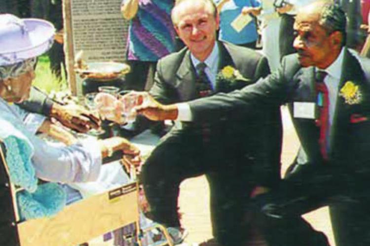 TO DEDICATE the Freedom Fountain on Liberty Square in 2001, Lulu Johnson Fielder, 102, toasts with water from the fountain with area leaders and, opposite from her, Gov. Bob Holden. MARK COFFEY | 2001