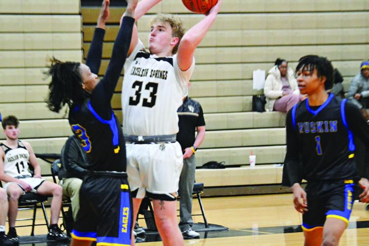 EXCELSIOR SPRINGS senior post player Trevor Stanton goes up for two points during the Tigers’ 100-60 Greater Kansas City Suburban Conference-Blue Division loss Feb. 3 to visiting Ruskin, a Kansas City-based school. DUSTIN DANNER | Staff