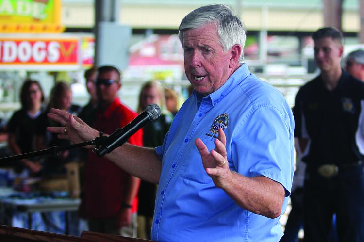 GOV. MIKE PARSON appears without a mask in mid-August at the Missouri State Fair where he talks about social responsibility being a better answer than wearing a mask to prevent the spread of COVID-19.