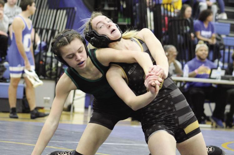 EXCELSIOR SPRINGS junior Alyssa Betts, right, works her way out of the bottom position in tournament action Dec. 28 at Center. DUSTIN DANNER | Staff