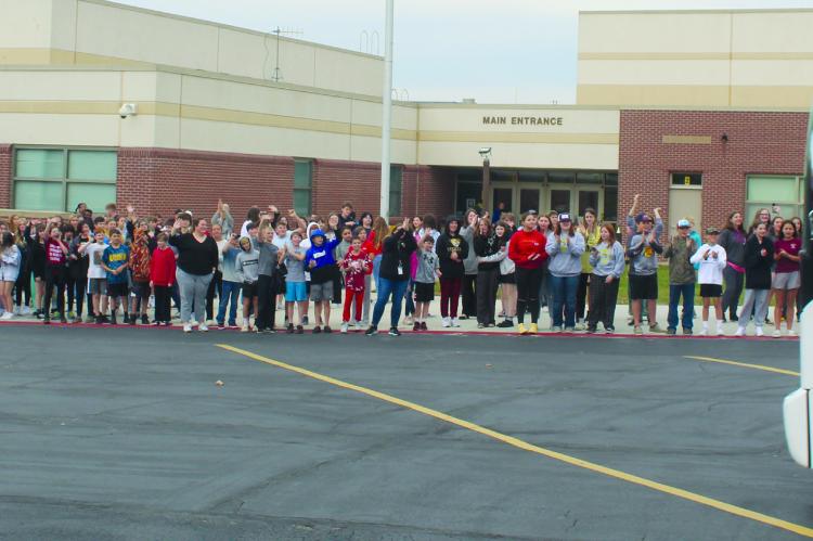 EXCELSIOR SPRINGS Middle School students cheer on the ES High School boys soccer team as they leave for the state Final Four. MIRANDA JAMISON | Staff