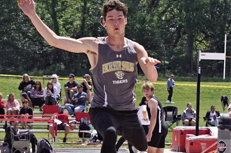 DALTON LAYTON, seen here jumping at a high school track and field meet, is moving on from Excelsior Springs to compete for Rockhurst University, an NCAA Division II program in Kansas City. DUSTIN DANNER | Staff