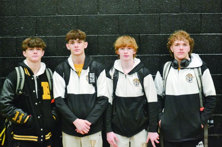 SOPHOMORE RYNE MARCUM, junior Micah Danner, first-year high schooler Cooper Collins and sophomore Hunter Scoma are representing Excelsior Springs this week in Class 2 state wrestling. DUSTIN DANNER | Staff