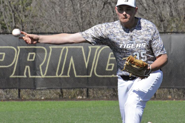 PITCHING SIDEARM is more physically demanding than it appears, as a certain sports editor has learned from covering Excelsior Springs baseball. SHAWN RONEY | Staff