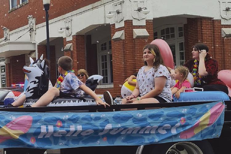 Parson’s Tow and Recovery pulls “Hello Summer” float down the parade MIRANDA JAMISON | Staff