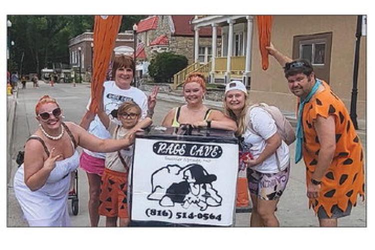 Rage Cave place third in the parade dressed as the Flintstones. SHARON DONAT | Staff