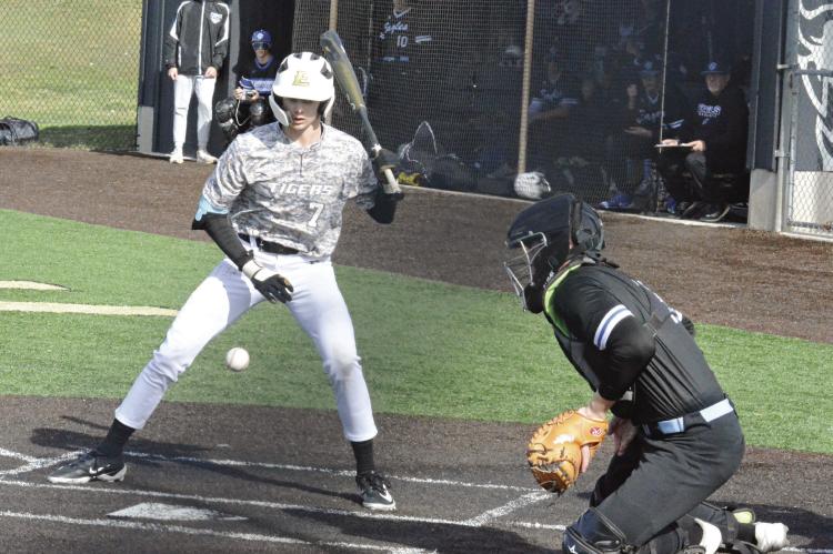 KAELAN BEDFORD, shown batting March 16 at Excelsior Springs against Summit Christian Academy, is among a crop of underclassmen looking to help the Tigers make another deep postseason run. SHAWN RONEY | Staff