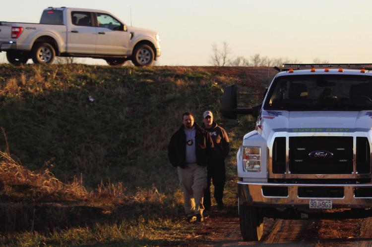RAY COUNTY Sheriff’s Department Investigators Josh Hamner (left) and Celeste Kaiser clear out the death investigation scene on Pryor Rd. in Ray County. MIRANDA JAMISON | Staff
