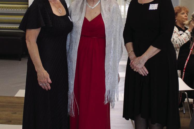 CINDY MORTON (from left), Shelia Gatlin and Becky Meirath dress their best for a night of fun at the Silver Prom.