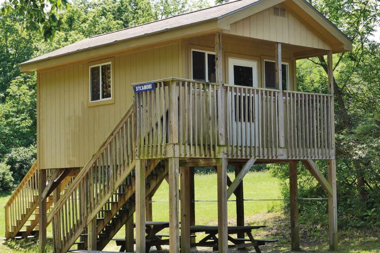 THE TREE HOUSE lodging is used for Outdoor Adventure Camp and provides shade below when the weather is warmer.