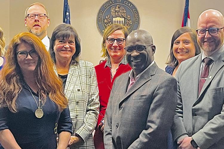 STATE AND FEDERAL administrators see the Clay County Parenting Court Program in action during a recent visit. The program is meant to serve as an alternative to incarceration and provides guidance to parents. MIRANDA JAMISON | Staff