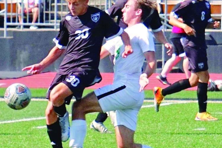 Excelsior Springs junior Austin Collins (No. 30), shown in action during a regular-season game, has been a goal-scorer in two postseason games for the Tigers, who seek a third straight, top-four finish at state in Class 2.