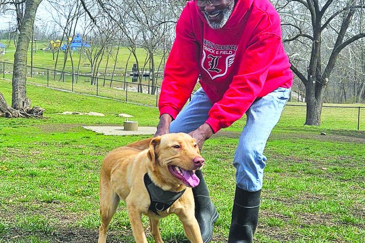 DON FARROW and his dog, Neptune, enjoy the weather by visiting Century Bark. “I love the city of Excelsior Springs and all the great things that come with it,” said Farrow. “The Community Center, this amazing dog park and all the other amenities show how beautiful this town is.” MIRANDA JAMISON | Staff