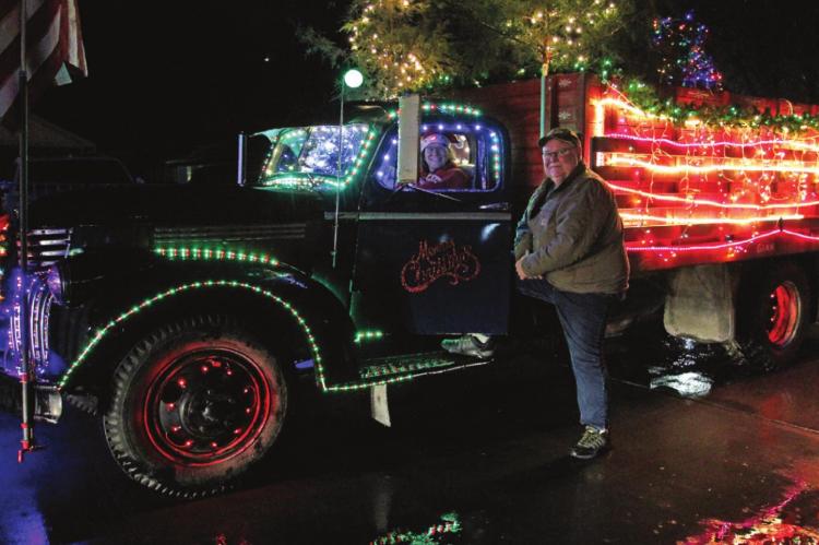 A 1947 CHEVY 1 1/2-ton pickup truck is decked out by Pandora and Mark Jones for the Excelsior Springs Christmas Lights “Edarap,” which is parade spelled backwards because the event is backward: Because of COVID-19, people drive past floats, instead of the other way around.