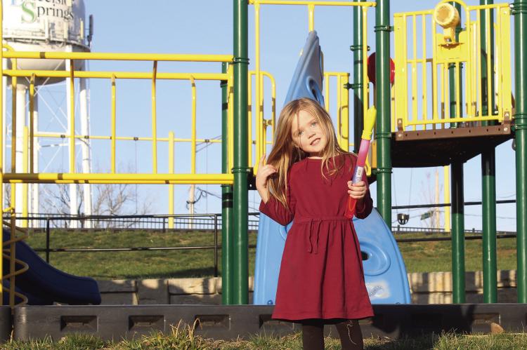 AURORA K. TAFF, 5, takes advantage of the warmer weather with playtime at the park. MIRANDA JAMISON | Staff