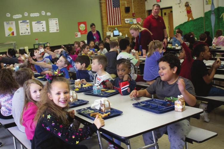 WRIGHT ELEMENTARY SCHOOL receives a grant so all students eat lunch free. The Flavor Bar’s most popular items are hot sauce and banana peppers. AMY MAYER | Harvest Public Media